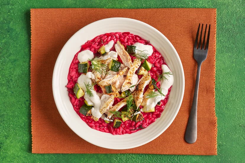 This colour-drenched beetroot risotto is flavoured with garlic, lemon and dill and topped with zesty strips of grilled chicken, courgette chunks and dollops of hot horseradish yogurt. Sunglasses optional, napkins very much not!