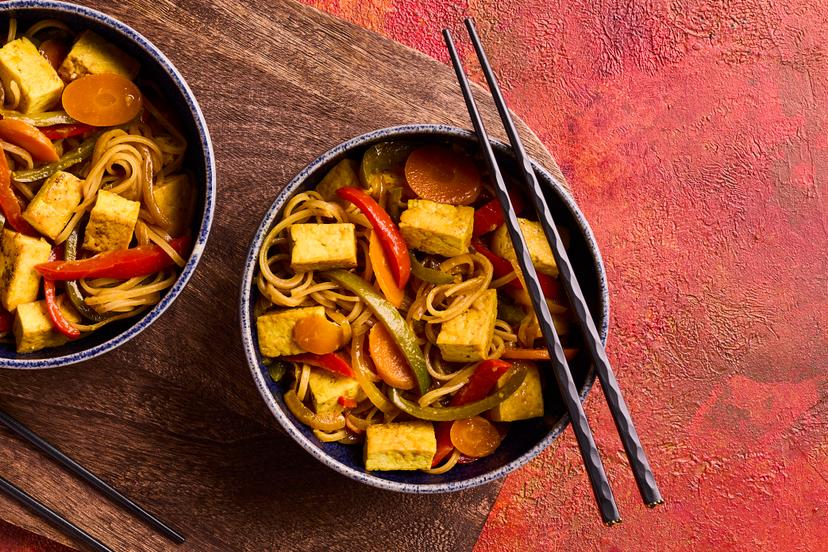 Versatile tofu gets an Asian-style makeover in our vegan version of this takeout classic. It’s fried till crispy, mixed with red and green peppers, carrot and onion, and tossed through noodles so everything’s smothered in the mouth-watering ginger, garlic and tamari sauce.