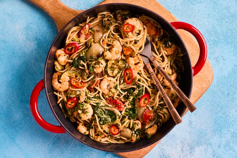 Take your taste buds to southern Italy, where this dish was born. We’ve added extra filling power to the classic chilli/lemon/prawn combo with lightly cooked summer veg – onions, courgette, spinach and tomatoes – tossed through lashings of spaghetti. Delizioso!