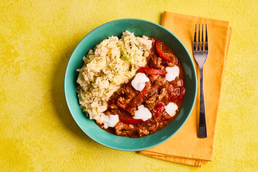 This robust Hungarian dish features strips of tender pork cooked in a rich and flavoursome tomato and red pepper sauce that’s spiked with paprika and chilli. We’ve upped the comfort food factor by serving it with a hearty cabbage and potato mash. Dig in!