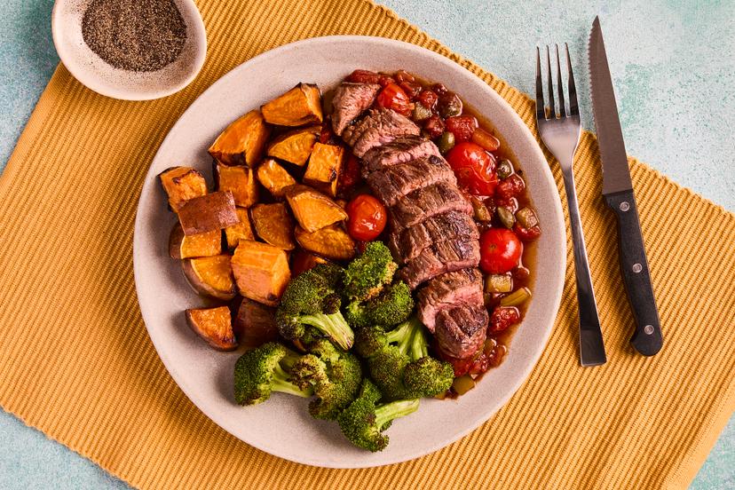 In the godfather of steak dishes, bavette (the butcher’s favourite!) is quickly seared and served alongside a punchy Sicilian-style caponata sauce made with onion, pepper, tomato and capers, with roasted sweet potatoes and broccoli.