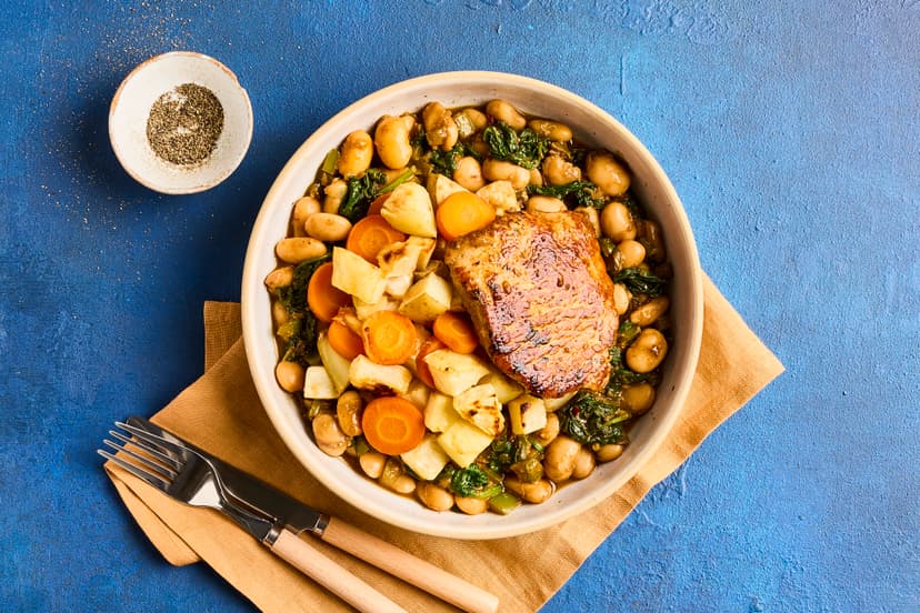 A classic of French country cooking, cassoulet is the ultimate comfort food. We’ve combined tender pork loin with butter beans and spinach in a creamy garlic and herb sauce, and served them with roasted potatoes, carrot and celeriac.