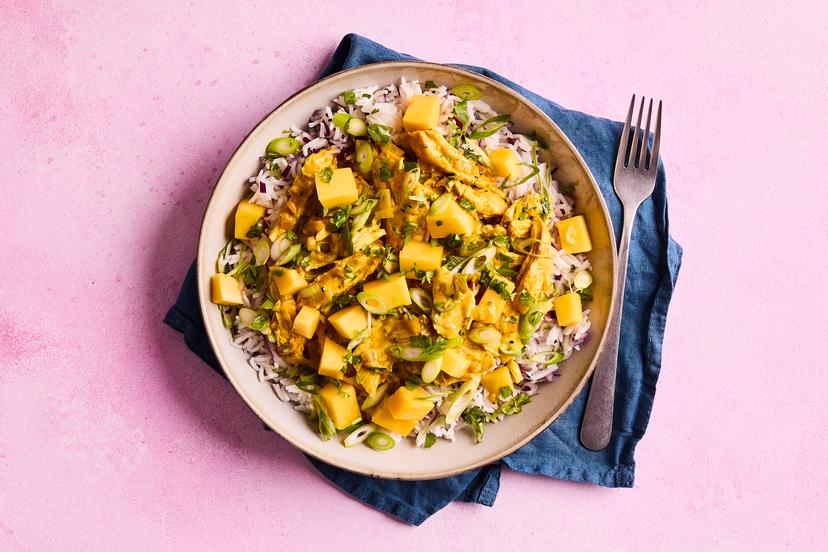 You’ll love our version of this classic, originally created for the coronation of Elizabeth II in 1953. Shredded chicken is stirred into an aromatic curry sauce with leeks, served with rice flecked with red onion and nigella seeds, finished with mango and sprinkled with coriander and spring onion. Definitely fit for a queen!