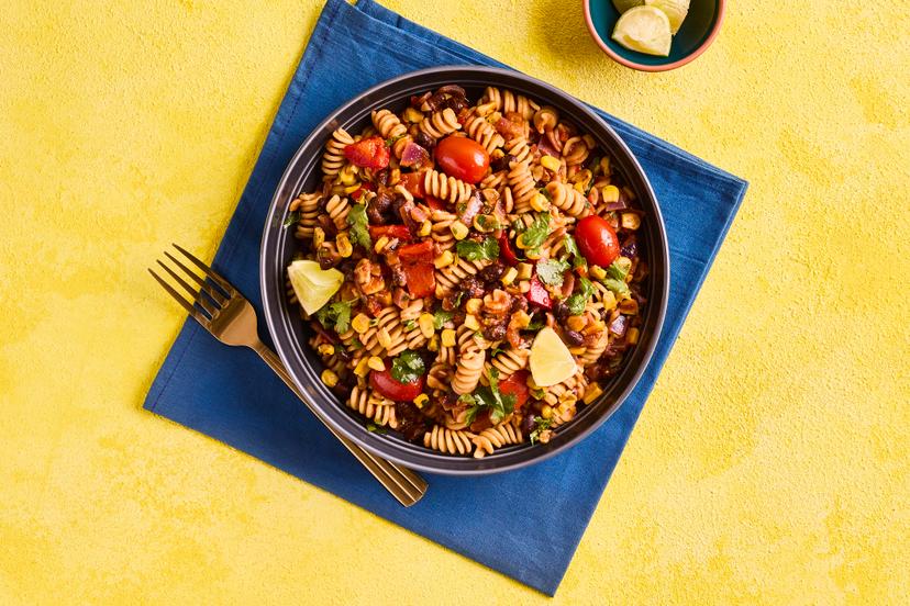 Can’t decide if you want chilli or pasta for dinner? Have both! A chunky medley of black beans, tomato, pepper and golden fried corn is stirred into pasta spirals to soak up the gorgeously spicy chilli sauce.