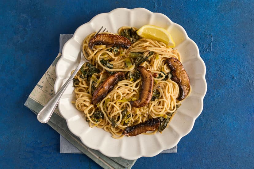 Prepare for a game changer! This recipe uses mashed parsnip to give a velvety texture and nutty taste to the sauce. It’s combined with leeks and cavolo nero cooked with shallots, garlic and thyme, finished with yogurt and lemon, and topped with chunky portobello mushrooms glazed in balsamic vinegar.