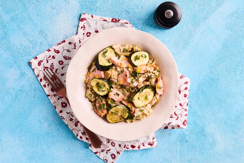 Bring a touch of luxury to a midweek dinner with this simply delicious dish. Tender flakes of salmon combine with the subtle aniseed flavour of fennel, sweet leeks and courgettes, cooked with herbs and stirred into creamy rice. It’s finished with basil and lemon.