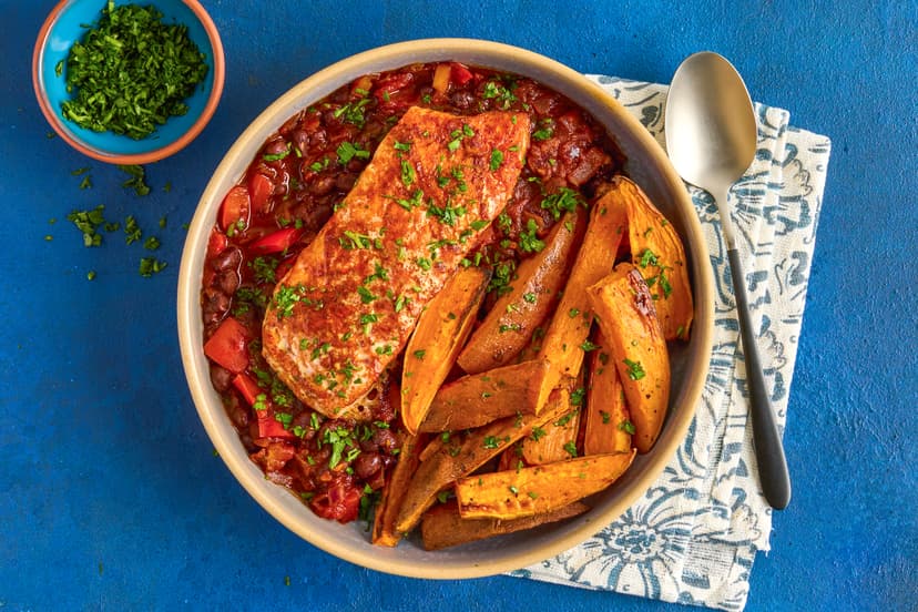 Take your taste buds on a road trip to America’s Deep South, home of rich barbecue flavours. Our salmon is roasted with a hint of paprika, and served with a stew of smoky black beans, tomatoes and red pepper, alongside golden sweet potato wedges.