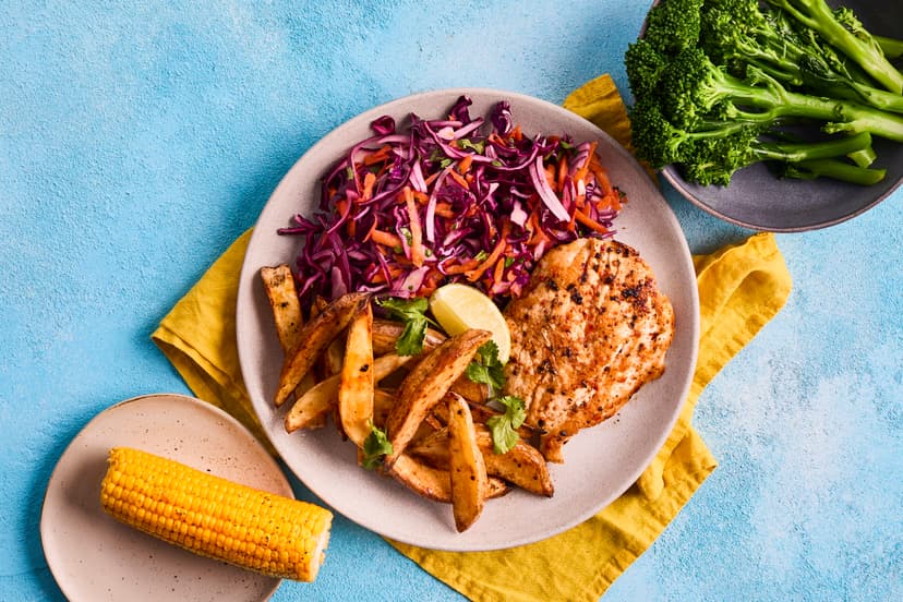 This is weeknight chicken – with the volume turned up! A sprinkling of Portuguese-style peri-peri seasoning adds its spicy magic to roasted chicken breasts, peppers and onions. With long-stem broccoli, sunny sweetcorn and a rainbow slaw, it’s a riot of flavours, colours and contrasting textures that’ll perk up your plate and satisfy your stomach.
