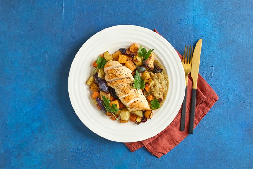 A traditional Sunday-style chicken dinner that’s ready in 45 minutes? With minimal washing-up? Don’t mind if we do! Tuck into tasty chicken breasts and crispy potatoes, plus roasted parsnips, swede and carrots, all made saucy with a thick garlic, herb and shallot gravy.