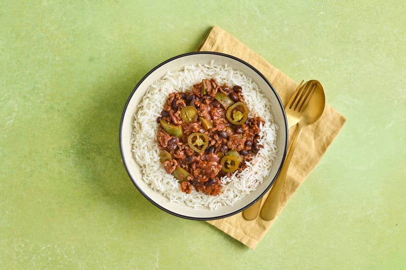 Take a trip down Mexico way! Beef mince is fried with onion, green pepper, garlic and Mexican spices, then simmered with black beans and passata, dished up with fluffy rice and scattered with jalapeños. Best of all, the vibe might be ‘long-haul’, but timings-wise it’s a ‘short hop’ and ready in 20 minutes.