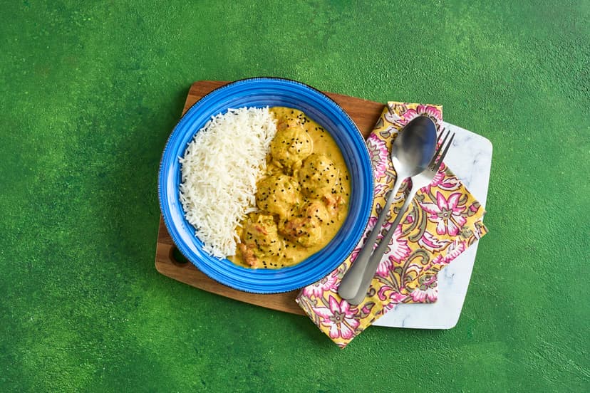 Adding grated courgette to our mildly spiced turkey balls gives them a fab fresh edge. Then they take a dip in an aromatic tomato sauce flavoured with garlic, ginger, chilli and garam masala. Finish with a swirl of yogurt, a sprinkle of nigella seeds and a side of fluffy rice – then dive in yourself!