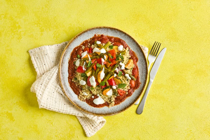Fast-track yourself to flavour town and pop this North African-inspired meal in your box! It makes the most of seasonal asparagus – paired with red pepper and courgette, tossed with harissa paste, then grilled till tender. Serve on a tangy tomato base and a bed of couscous loaded with preserved lemon, coriander and mint.