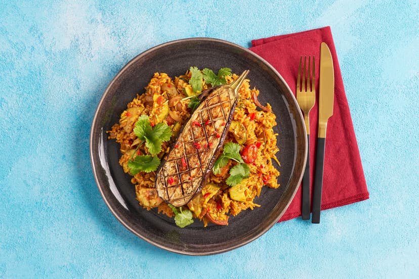 It’s hot, it’s herby, it’s heavenly… it’s our take on the spicy West African rice dish. This version is a joyous plant-based jumble of aubergine, courgette, red onion, tomatoes and rice in a garlicky, gingery, chilli-spiked tomato sauce. Brace yourself, it’ll knock your socks joll-off!