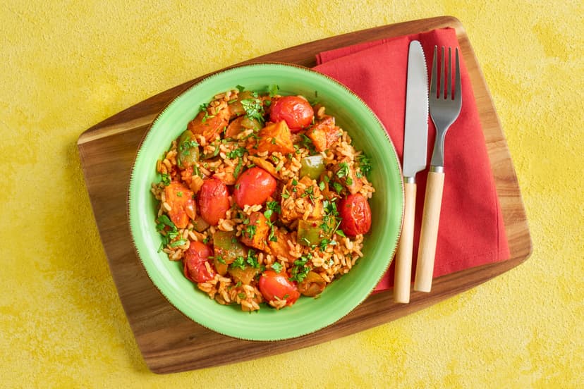 Soft, sticky sweet potatoes are at the heart of this Louisiana-style soul food feast, which also features green pepper, baby tomatoes and wholesome brown rice, simmered in a rich tomato sauce that’s perked up with garlic, oregano, smoked paprika and a sprinkling of chilli flakes.