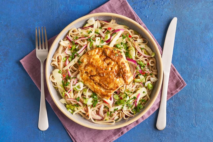 Chunky cod fillets are smothered with a zingy ginger, garlic and lime glaze and grilled, then served on an aromatic bed of noodles flavoured with fennel, chilli and coriander. Add a quick zip of lime and you’re done – ready, steady, slurp!