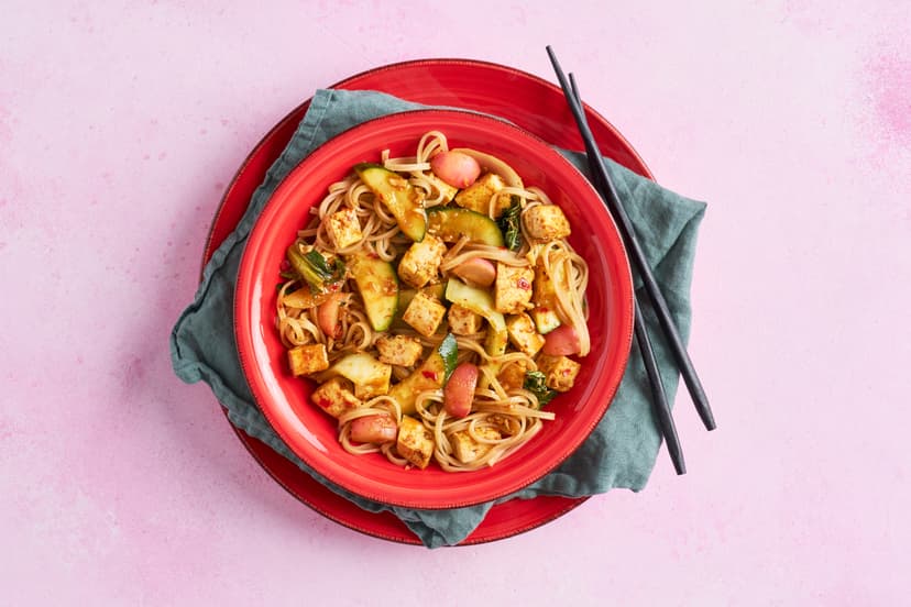 Our bespoke gochujang paste is a real game-changer, especially when unleashed on sizzled tofu! Pak choi, radishes and onion in the mix bring the crunch, while filling brown noodles add satisfaction and up the slurp factor.