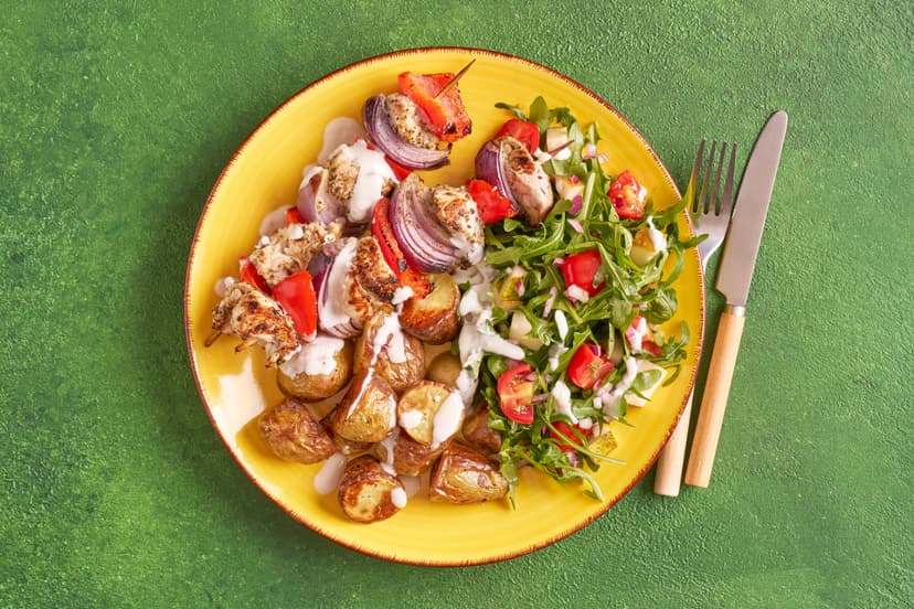 Fresh, fruity and full of flavour, this summery dish is a doddle to make. Onion, red pepper and turkey skewers scented with oregano team up with baby roast potatoes and a rocket, tomato and pear salad with a zesty lemon dressing. It’s finished with a delicious drizzle of garlicky yogurt.
