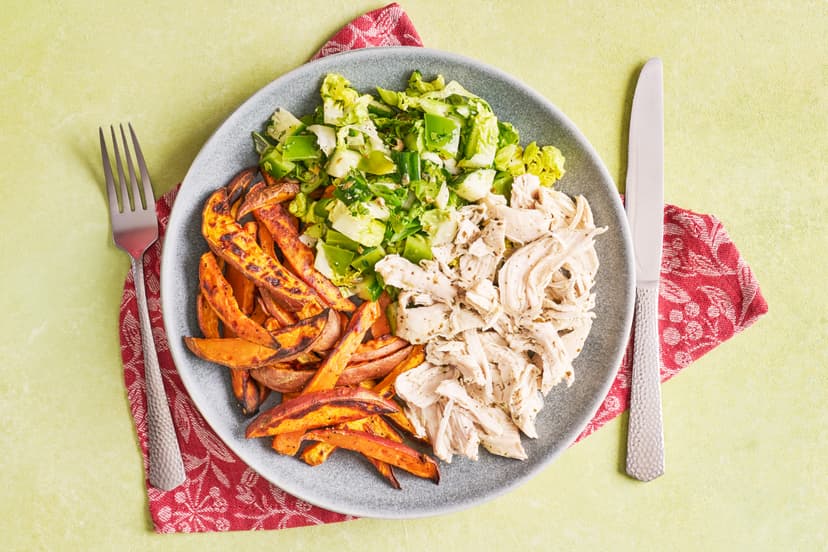 Gorgeously garlicky chicken breasts (foil-baked to preserve their juiciness), sweet potato fries and a crisp green salad... welcome to summer on a plate. Our chefs have really upped the ante with that side salad – mixing in coriander, mint, chilli and capers shows gem lettuce the time of its life!