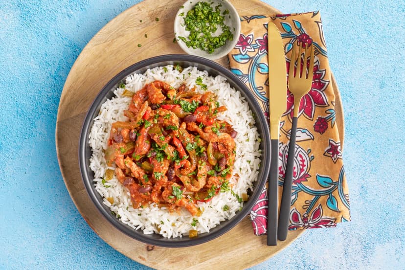 You’ll get a kick out of this! Pork strips are sizzled with red onion, green pepper and chilli, then simmered in a spicy tomato sauce with black beans. And if the sprinkle of lime and chopped coriander don’t convince your taste buds they’re in Mexico, the jalapeño-spiked basmati rice certainly will.