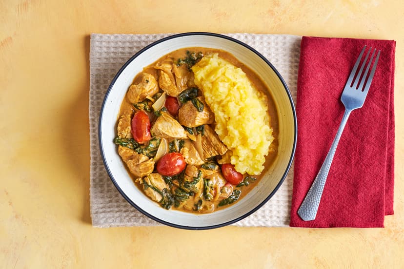 Diced chicken breast gets a quick simmer in a garlicky, herby sauce with baby tomatoes, onion and spinach, plus a creamy dollop of Greek-style yogurt. Dish it up with fluffy potato and swede mash spiced with nutmeg. And yes, it’s as smashing as it sounds!