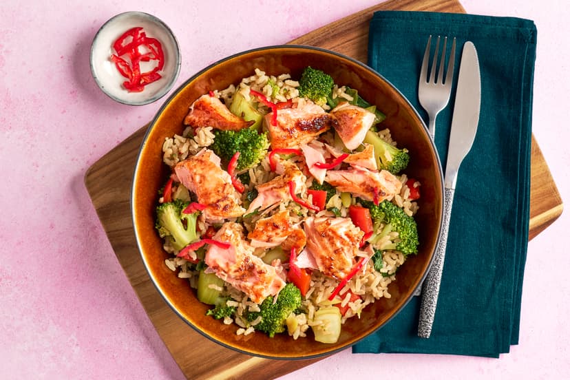 Wholesome and heavenly? What a keeper! Salmon fillets are smothered in a teriyaki glaze, grilled till sticky and scrumptious, then flaked into stir-fried broccoli, red pepper, spring onions and pak choi. Oh, and it’s served with brown rice to up the feel-good factor even more.