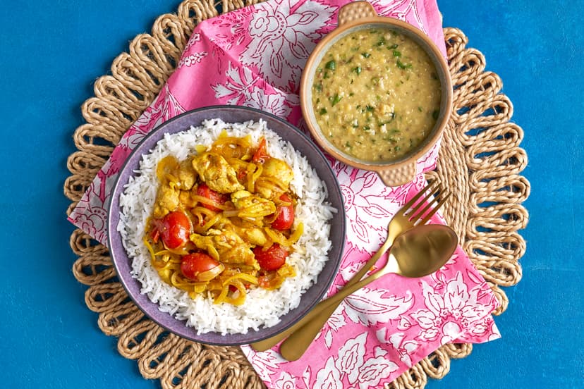 If you’ve never tried Nepali food, this quick curry is the perfect place to start! Juicy chicken thighs are fried with baby tomatoes, onion, fennel and mustard seeds, then simmered in a gently spiced, fragrant sauce. Served with basmati rice and a cumin-infused red lentil dhal, it’s dinner with a dash of discovery – and it’s on the table in 20.