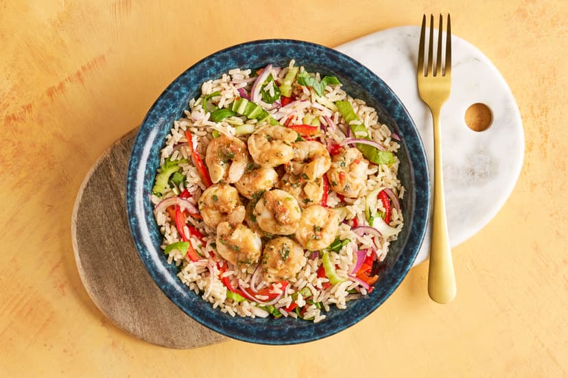 Prawns don’t come punchier than this! They’re sautéed with lemongrass, chilli, fresh coriander and lime zest, then piled onto brown rice that’s packed with crunchy veg and dressed with classic Thai flavours.