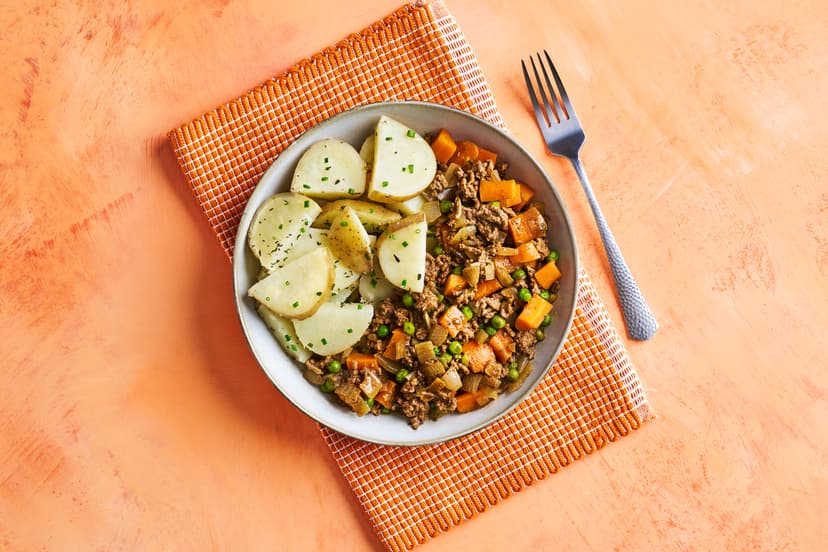 This cosy classic is the ultimate comfort food. Carrot, onion and beef mince are sizzled together, then simmered in a savoury sauce perked up with herbs, garlic and a magic dash of Henderson's Relish. Pop in some peas and serve with spud slices to unlock next-level loveliness.