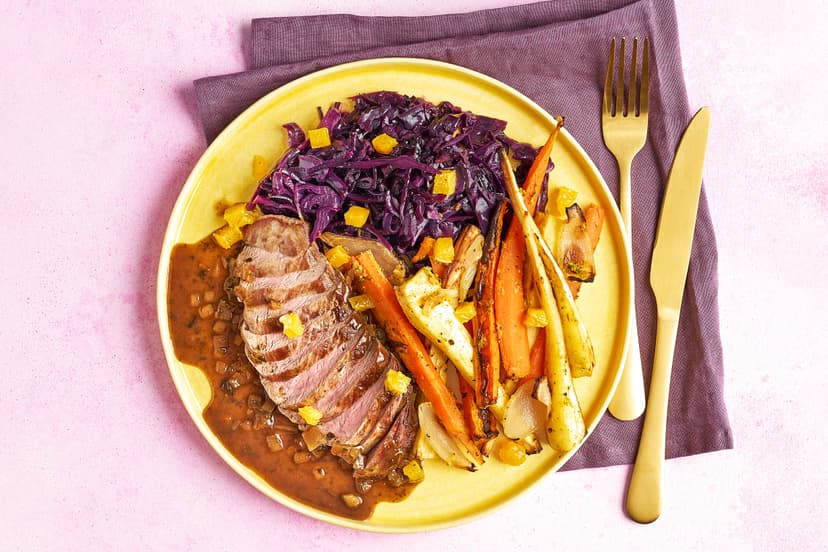 Step aside, turkey. There’s a new festive centrepiece in town. Duck breasts are drizzled with a herby, balsamic onion gravy, dished up with roasted carrots and parsnips tossed in orange zest, thyme, garlic, ginger and nutmeg, plus festive red cabbage and a scattering of diced orange.