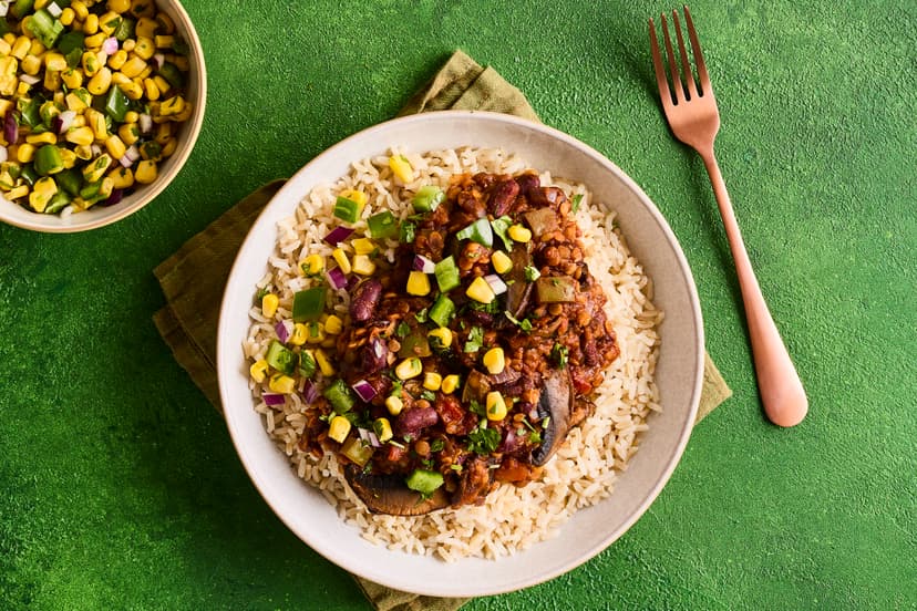 This plant-powered dish is packed with portobello mushrooms, red kidney beans and lentils, while our bespoke spice mix brings the heat. Top things off (and cool things down) with a super-easy sweetcorn, green pepper and coriander salsa. Served with brown rice, it’s guaranteed to send hunger packing.
