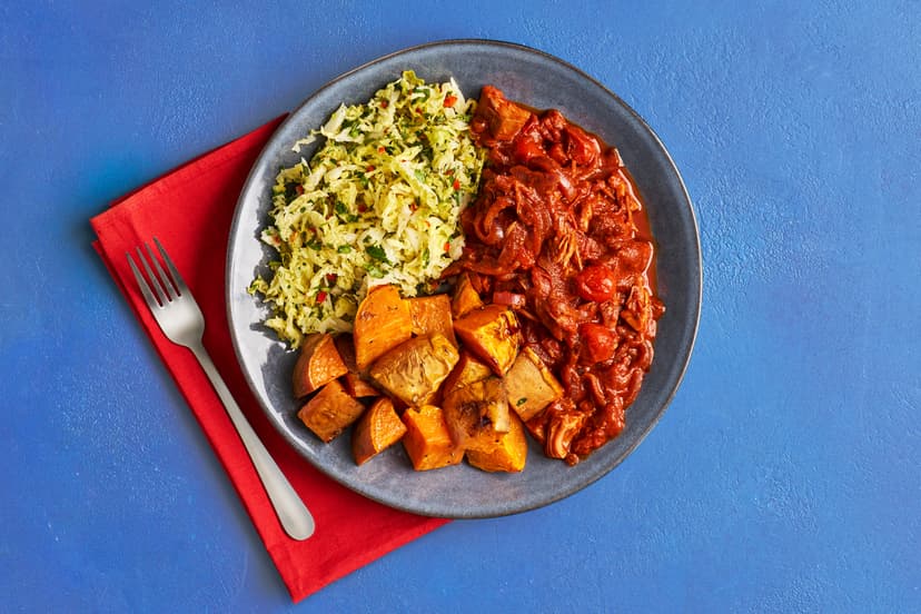 Clever old jackfruit. This versatile ingredient soaks up smoky flavours like a dream. Here, itʼs served with golden roasted sweet potatoes and a side of tangy coriander cabbage, which has a hint of heat from finely-chopped chilli and a bit of zing from tamari.