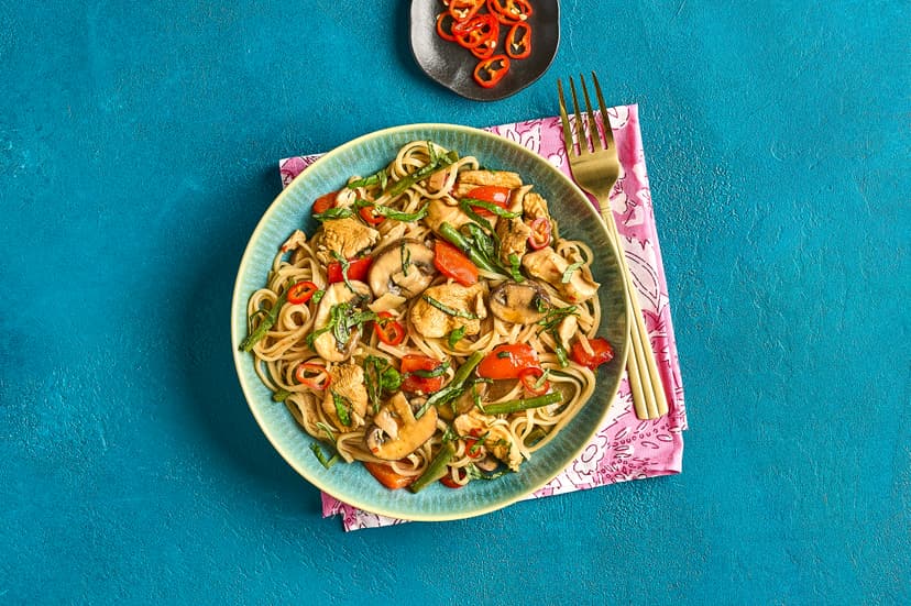 This cracker of a dish is a real crowd-pleaser. Strips of chicken are marinated in tamari, ginger, garlic and oyster sauce, with a hint of chilli, stir-fried with mushrooms, green beans, pepper and noodles, then finished with chilli and basil. Oh, and it’s on the table in half an hour – yay!