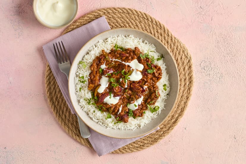 This rich, spicy beef and kidney bean slow cooker chilli is the perfect meal to prepare ahead for busy weeknights or to leave gently simmering while you head out and have fun at the weekend.