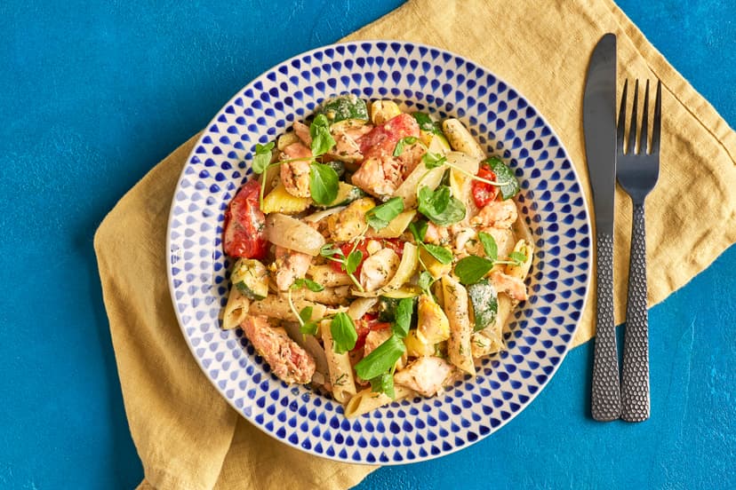 Our Italian-inspired fish dish is quite the catch. Onion, baby tomatoes and courgette are simmered in a garlicky herb sauce – the perfect base to gently poach chunks of smoked haddock, salmon and cod. A dash of lemon zest and juice and a scatter of dill bring the zing, ready for a swirl of yogurt, plenty of pasta and posh pea shoots.