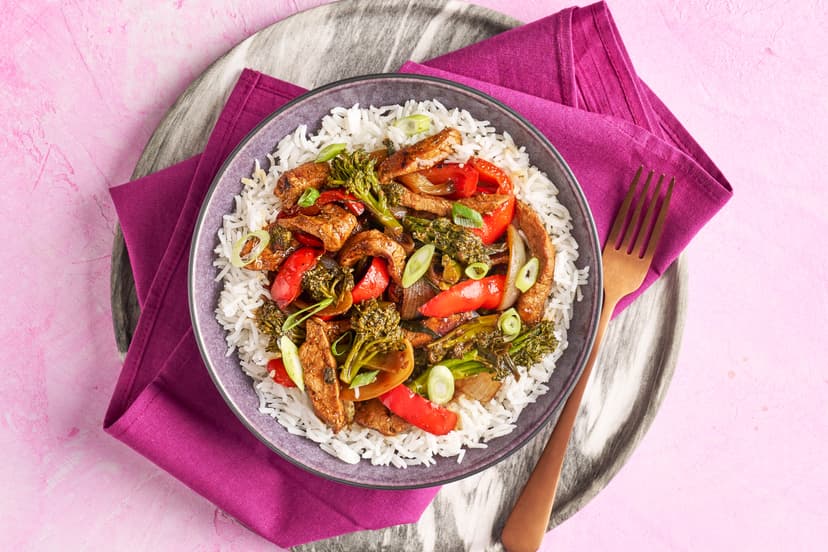 A trio of umami-licious ingredients – tamari, balsamic and oyster sauce – give this ‘in a flash’ stir-fry of pork strips, long-stem broccoli, red pepper and spring onions instant depth, while chilli flakes, garlic and ginger add pep. Fluffy rice is the yin to the sizzling pork’s yang.