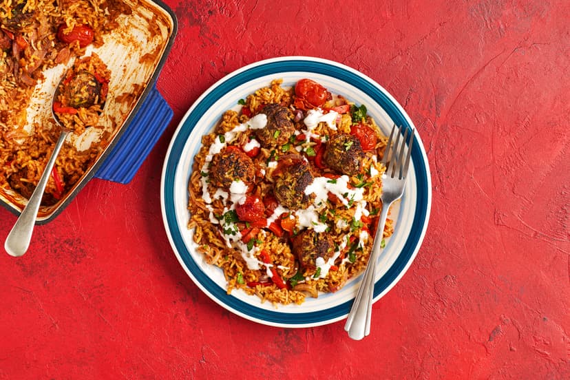 High on flavour, low on washing-up, this all-in-one is a Mexi marvel! Onion, pepper and tomatoes are jumbled with rice, our special spice blend and a garlicky tomato sauce for a quick oven bake. Add juicy beef meatballs (the secret is grated courgette) and itʼs back in the oven for a blast of heat to fire up those gorgeous flavours.
